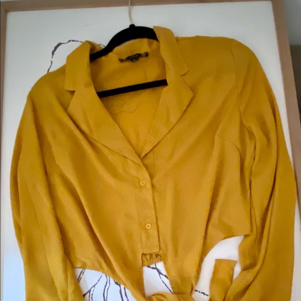 Mustard colored with tie